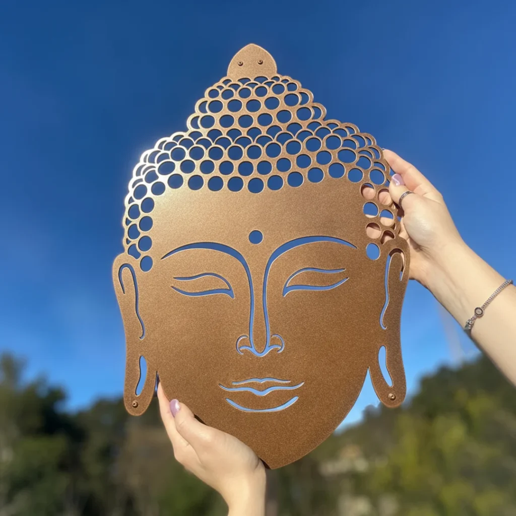 Buddha face metal wall art in copper color
