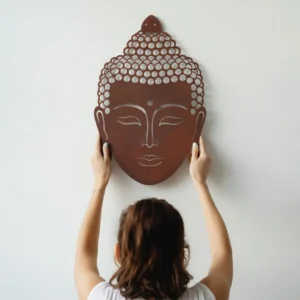Buddha face metal wall art in copper color
